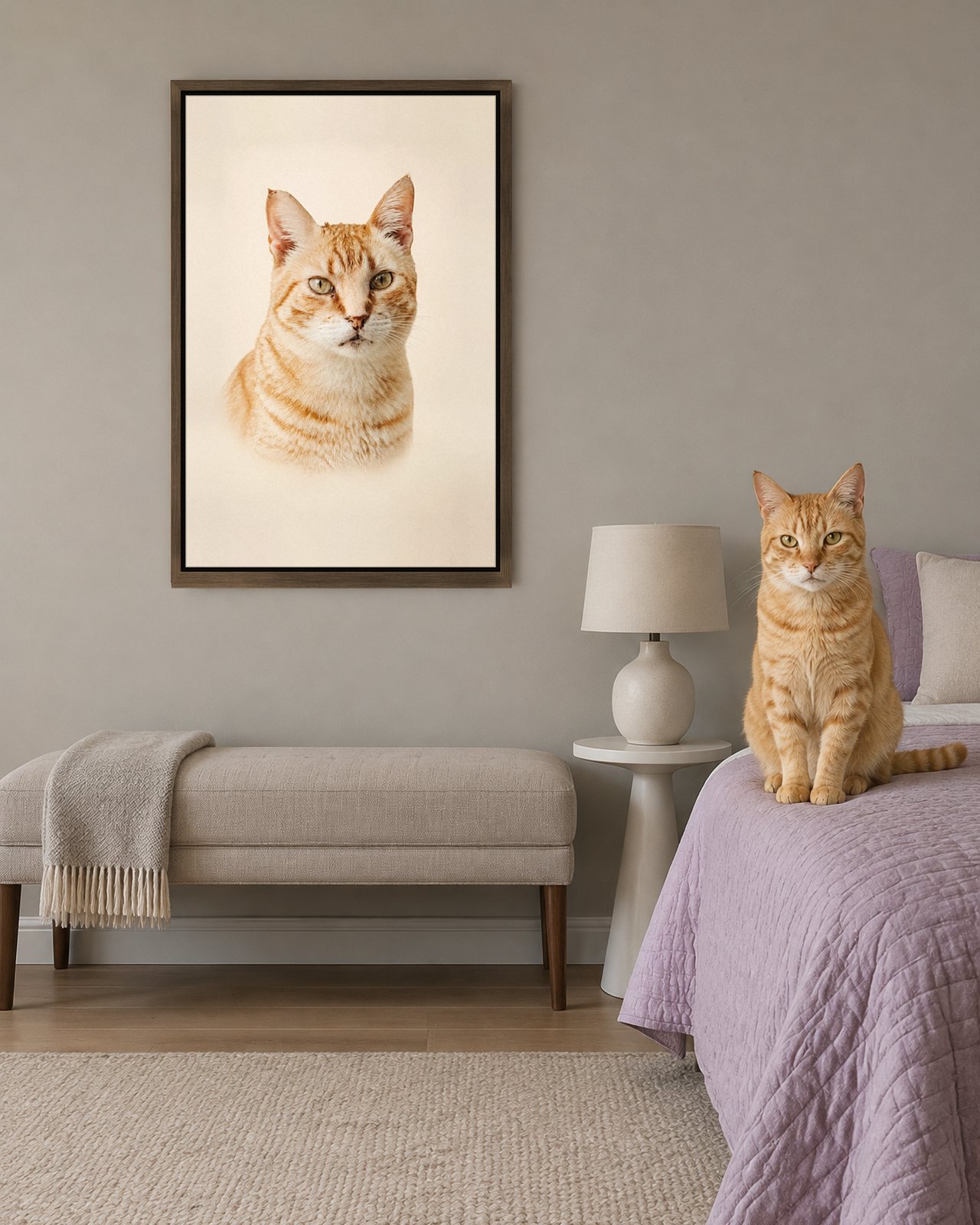 Simply Them portrait on canvas in a brown floating frame in a heather-grey guest bedroom, with the cat beside it