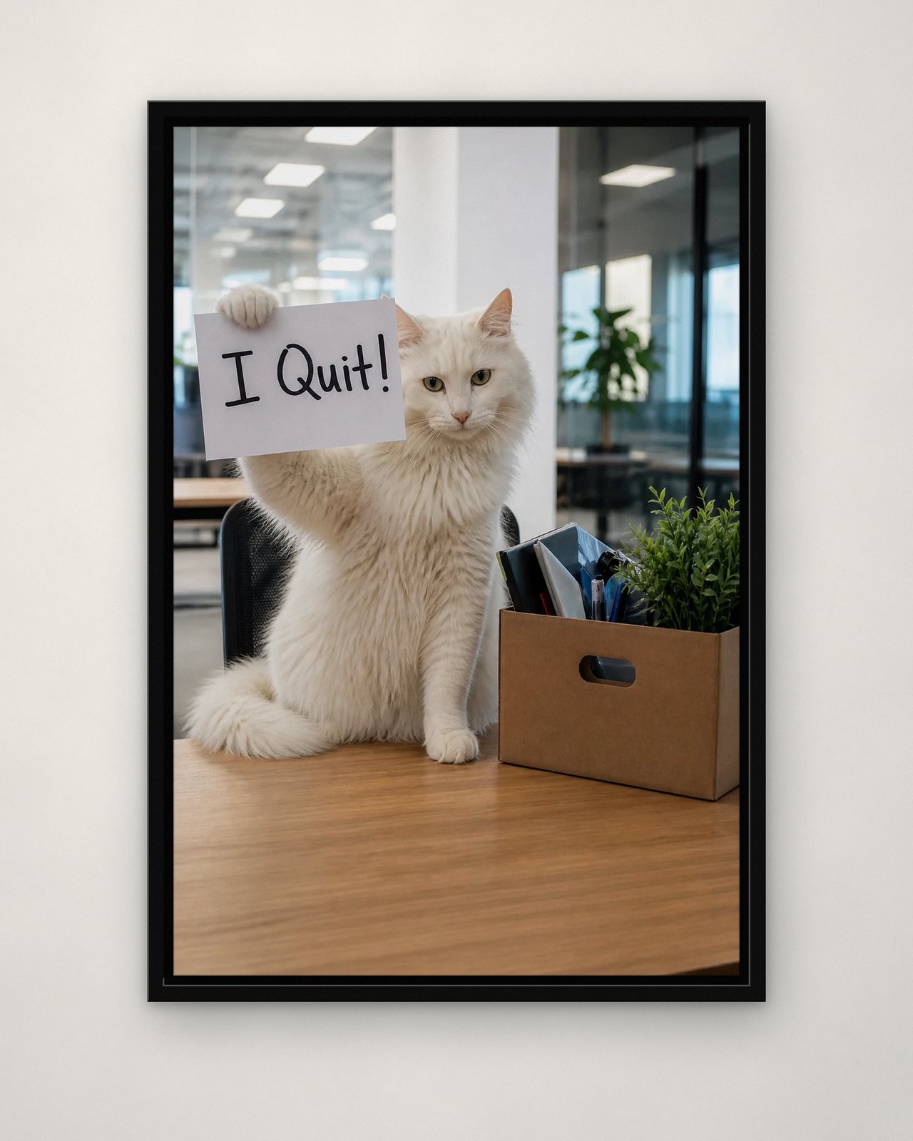 I Quit! portrait on canvas in a black floating frame on a plain wall