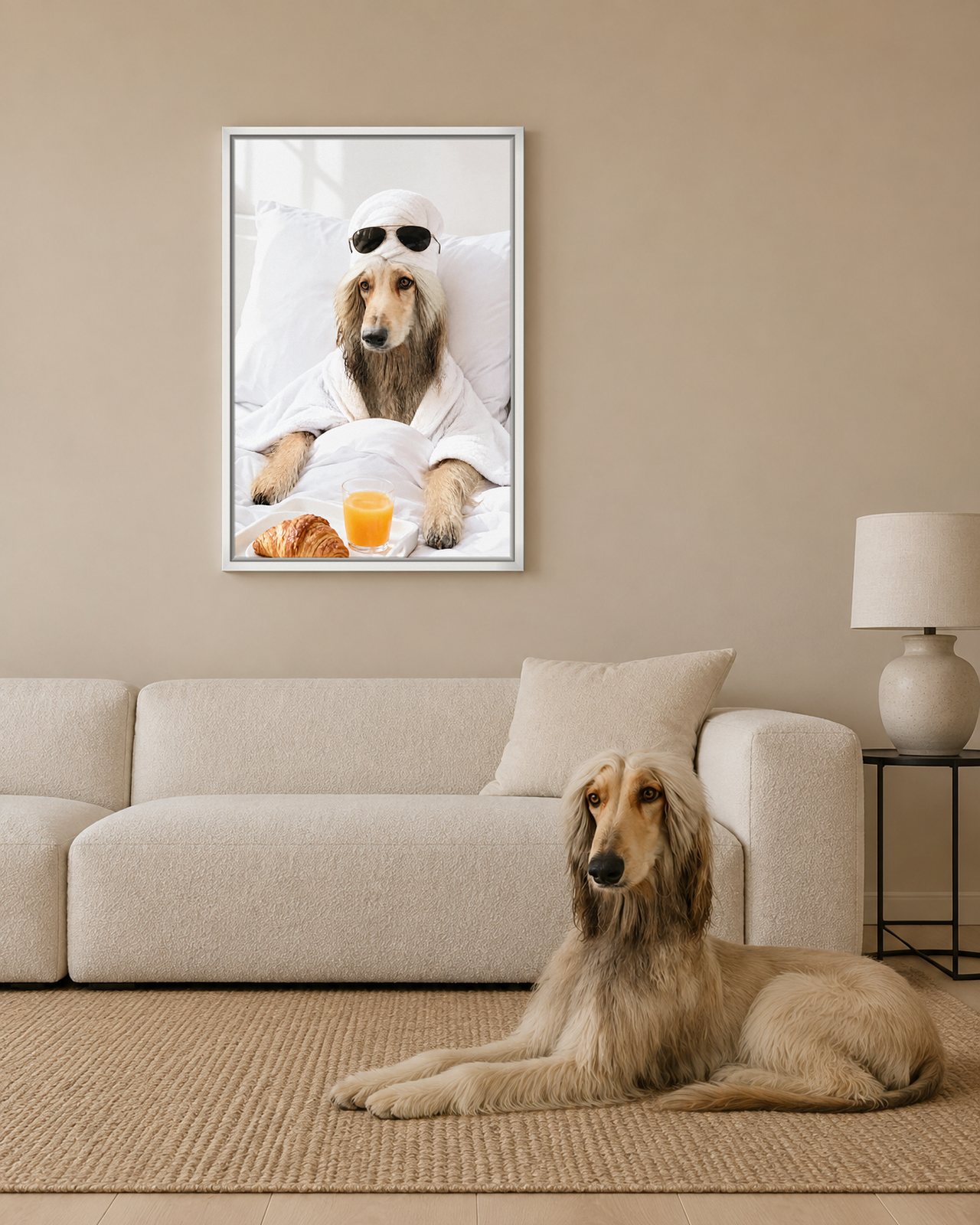 Sunday Lie-In portrait on canvas in a white floating frame in a sand-coloured living room with a low sofa, with the dog beside it