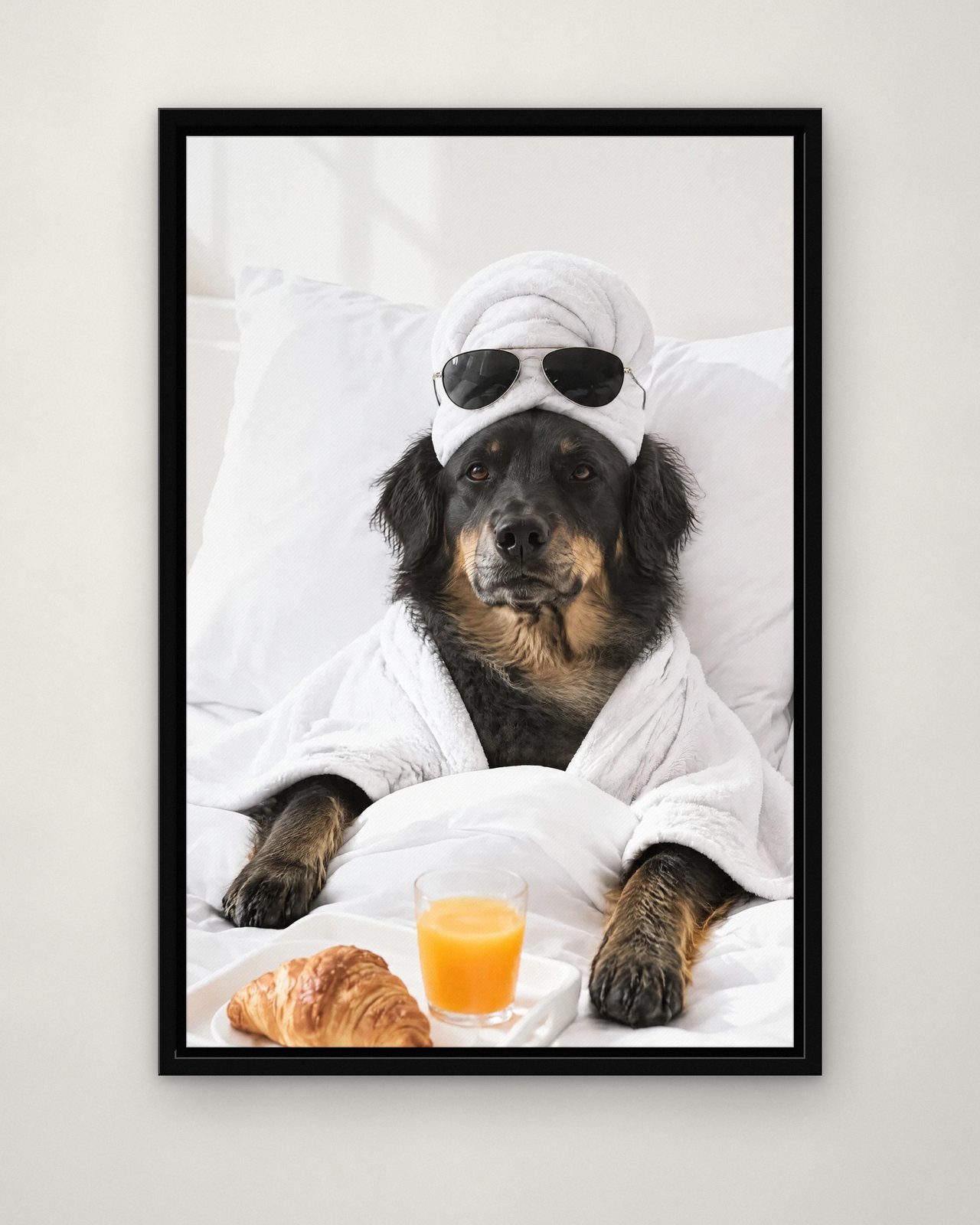 Sunday Lie-In portrait on canvas in a black floating frame on a plain wall