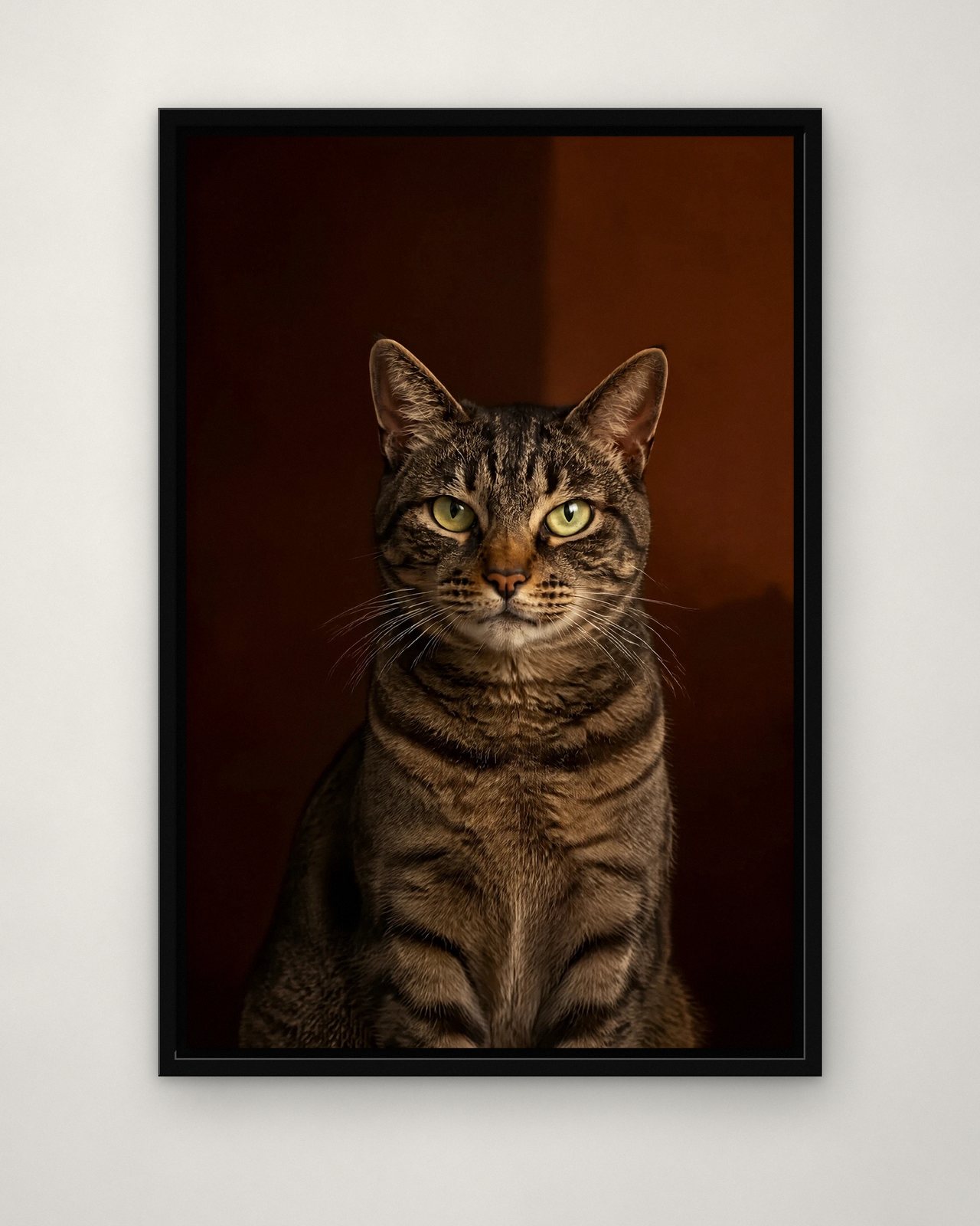 Timeless portrait on canvas in a black floating frame on a plain wall