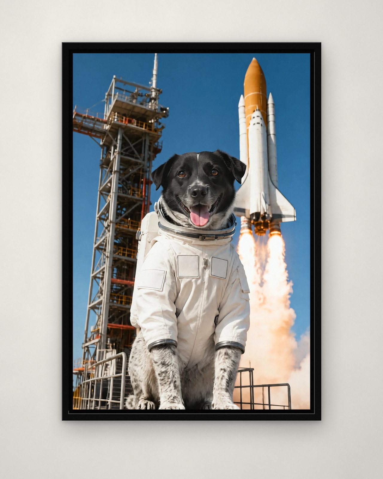 Launch Day portrait on canvas in a black floating frame on a plain wall