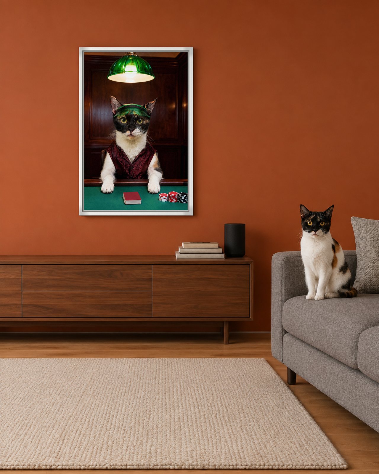 Playing Poker portrait on canvas in a white floating frame in a rust-orange media room, with the cat beside it