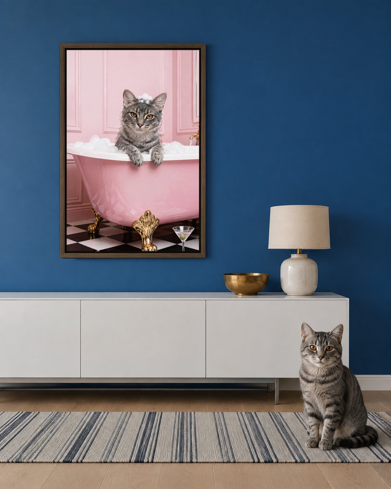 Pink Clawfoot Tub portrait on canvas in a brown floating frame in a cobalt-blue entrance hall, with the cat beside it