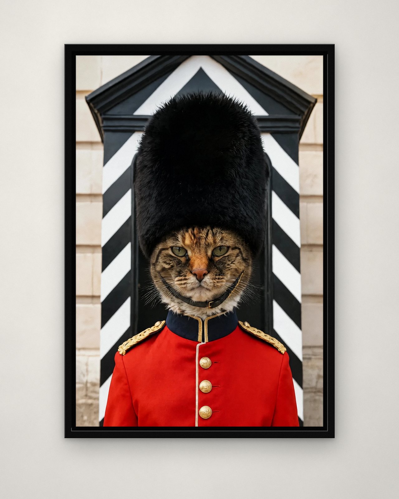 Royal Guard portrait on canvas in a black floating frame on a plain wall